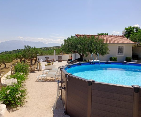 Outdoor pool at Holiday House Marija